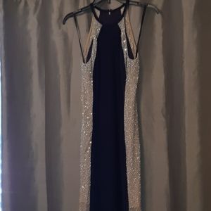 An Evening Gown, New, without tags.
